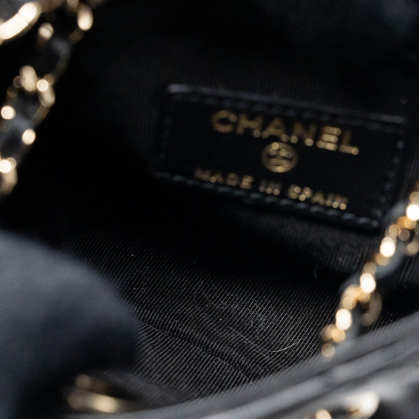 Chanel quilted super mini tote with chain lambskin black L
