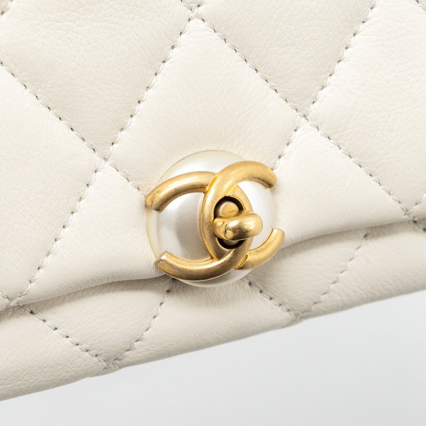 Chanel quilted mini flap bag Calfskin white