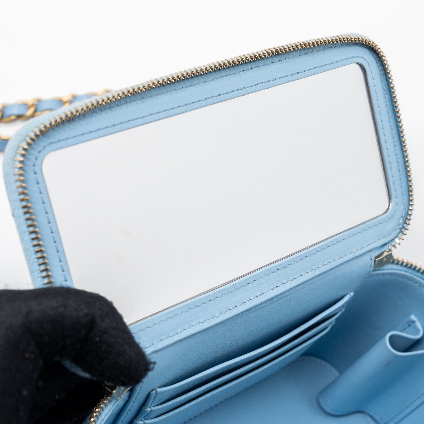 Chanel detailed top handle long vanity with chain caviar light blue