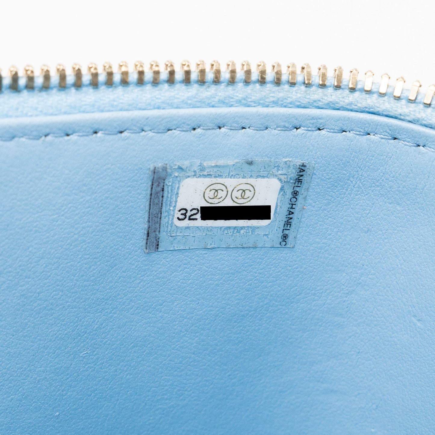 Chanel detailed top handle long vanity with chain caviar light blue