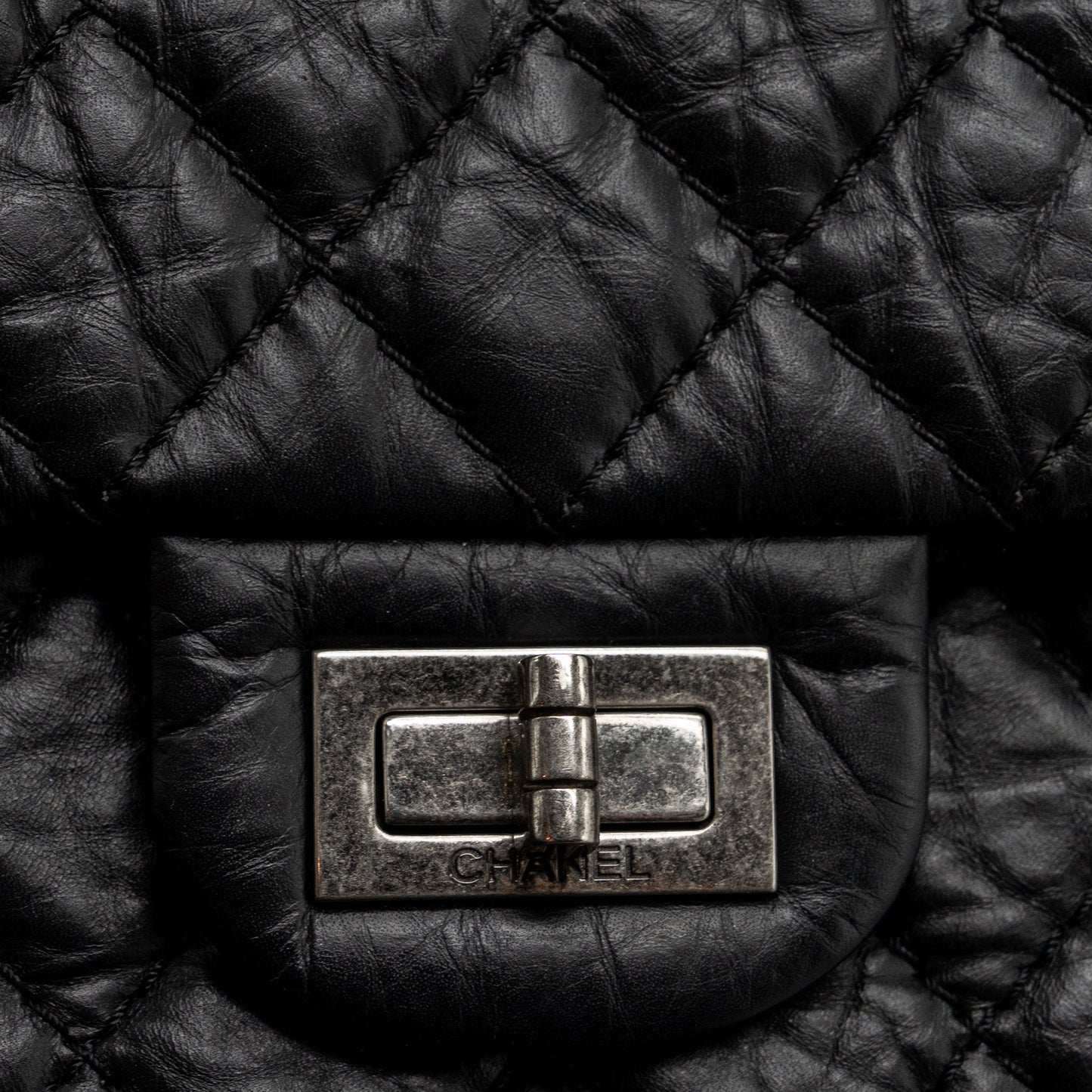 Chanel small 2.55 reissue flap bag aged calfskin black ruthenium