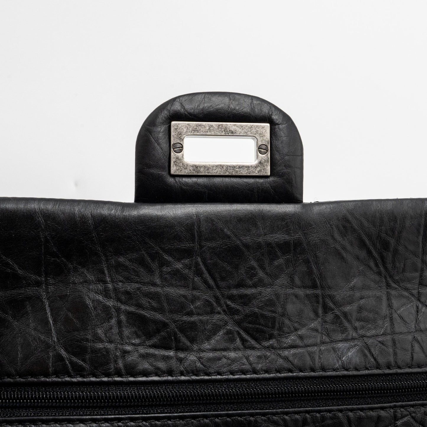 Chanel small 2.55 reissue flap bag aged calfskin black ruthenium