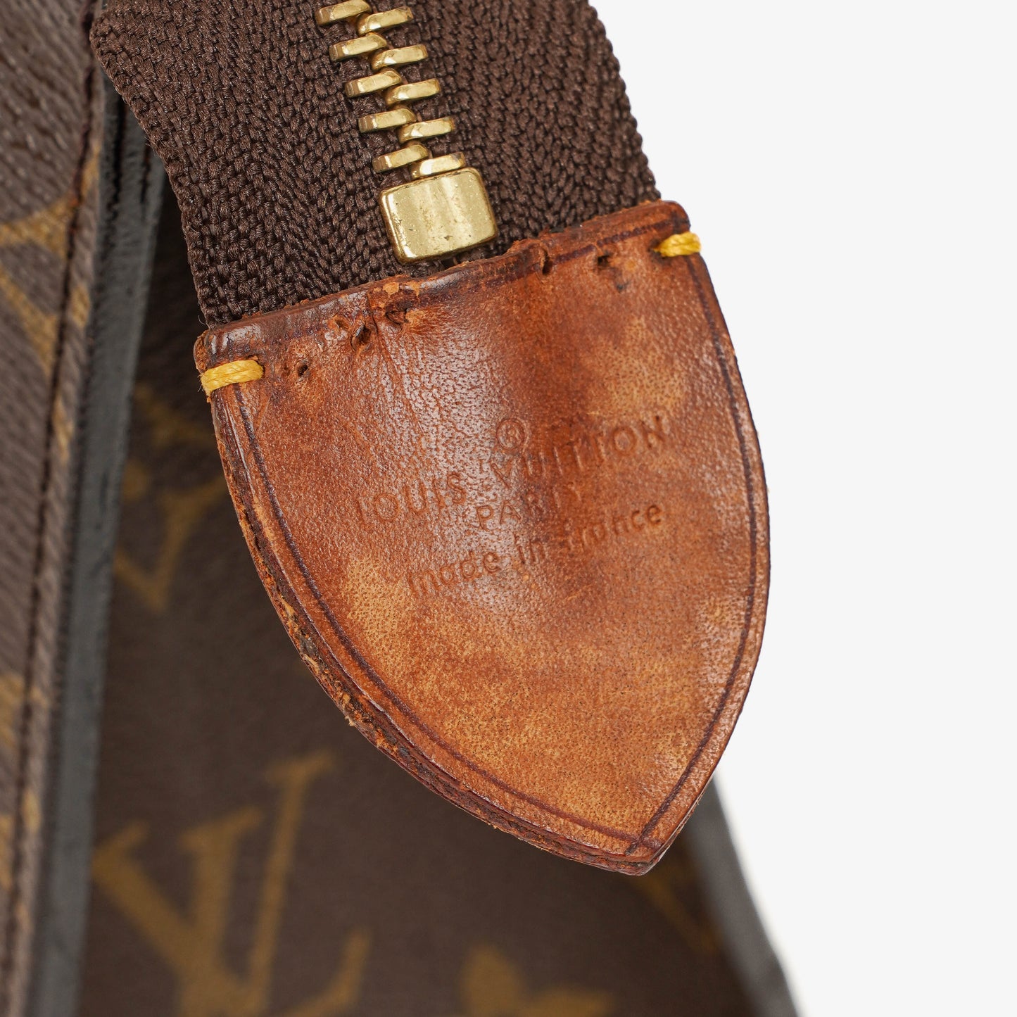 Louis Vuitton Sac Triangle Monogram Handbag