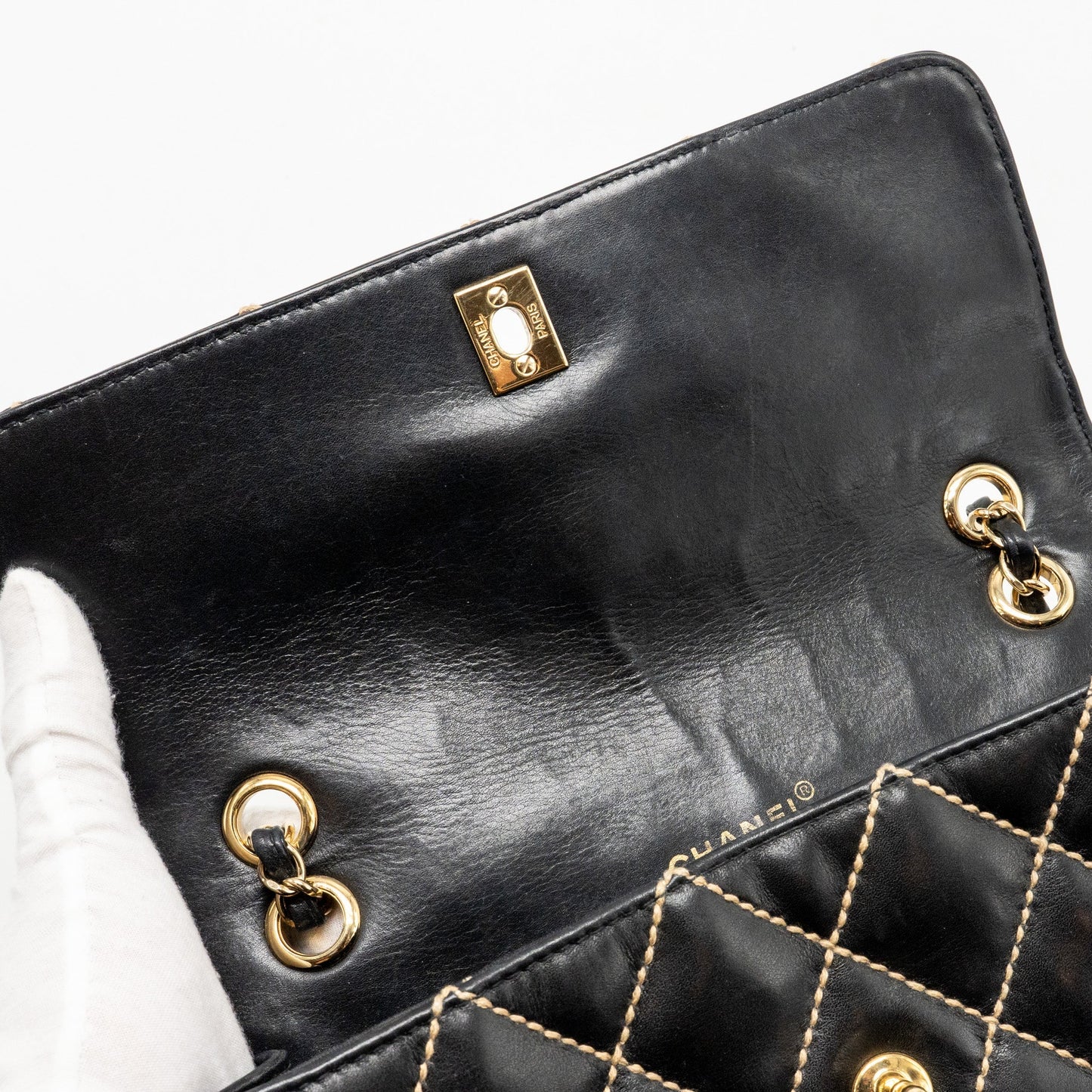 Chanel  quilted flap bag lambskin black with white stitching