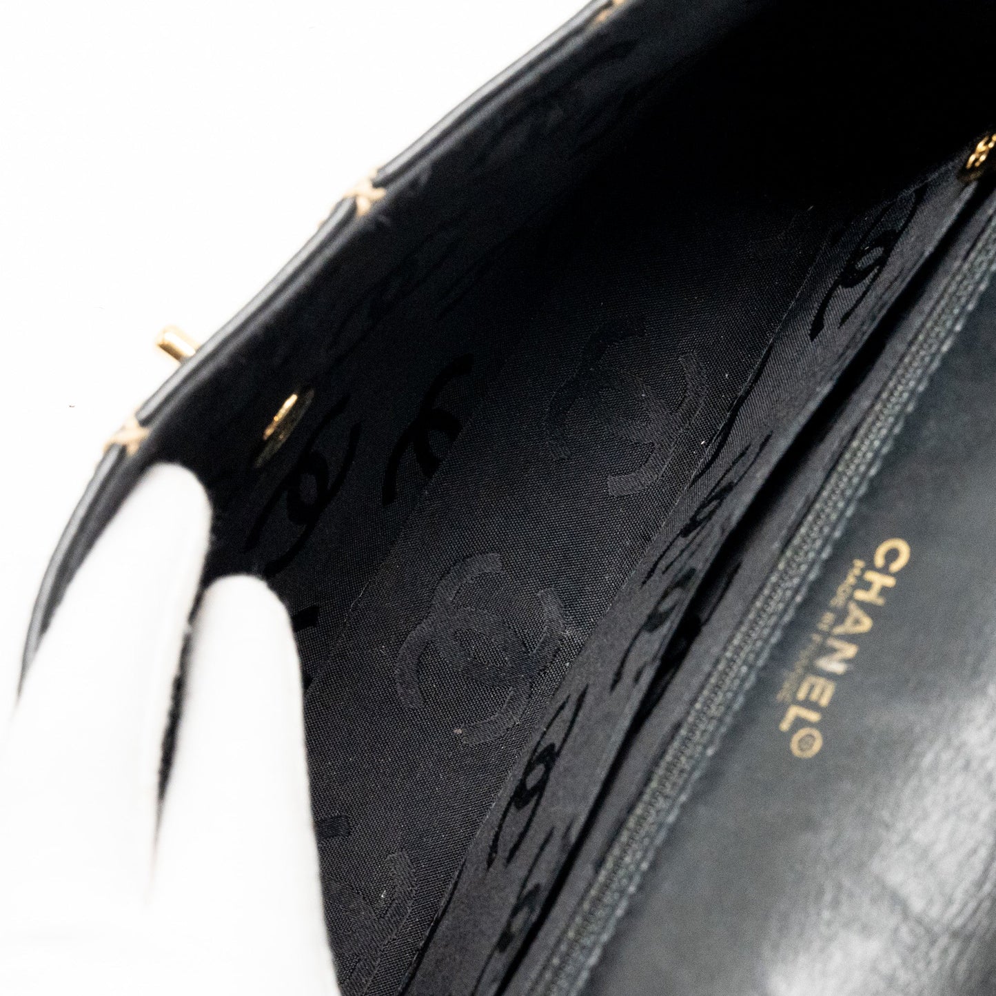 Chanel  quilted flap bag lambskin black with white stitching