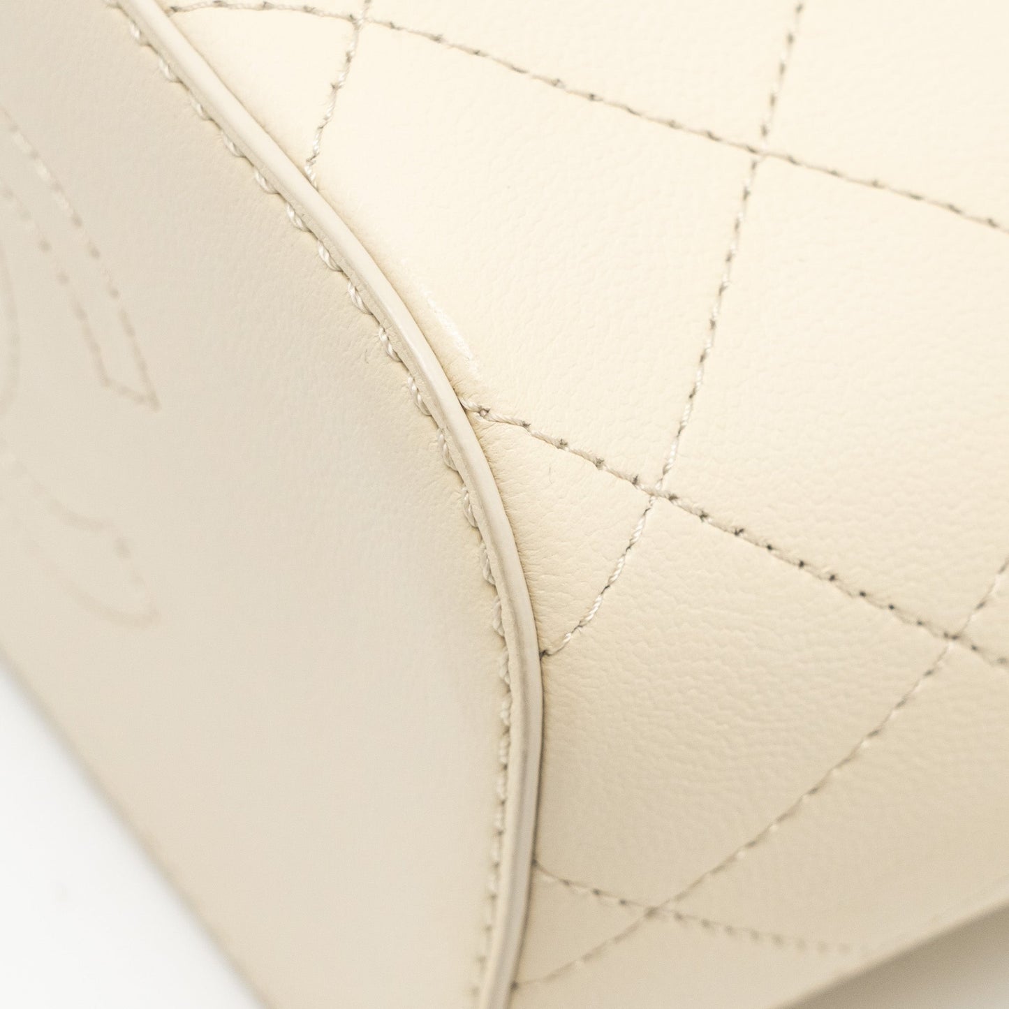 Chanel bucket bag lambskin creamy white