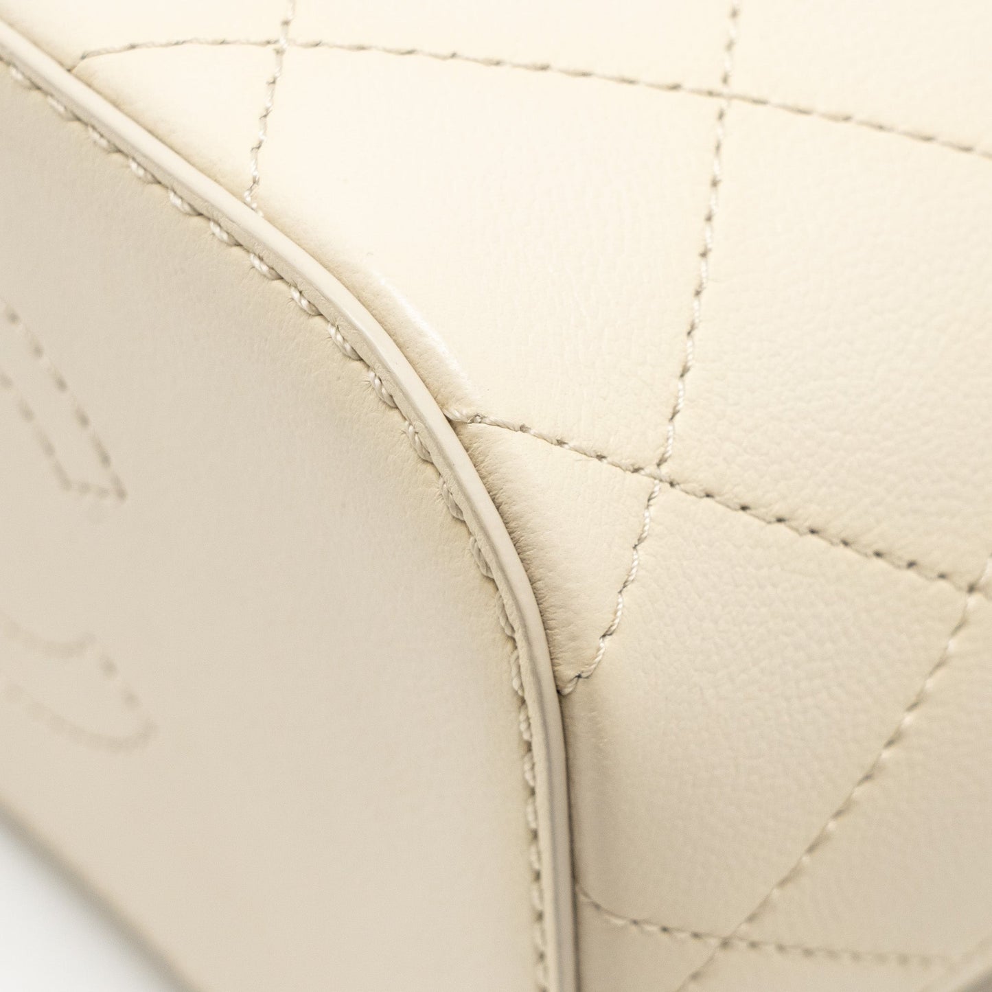 Chanel bucket bag lambskin creamy white