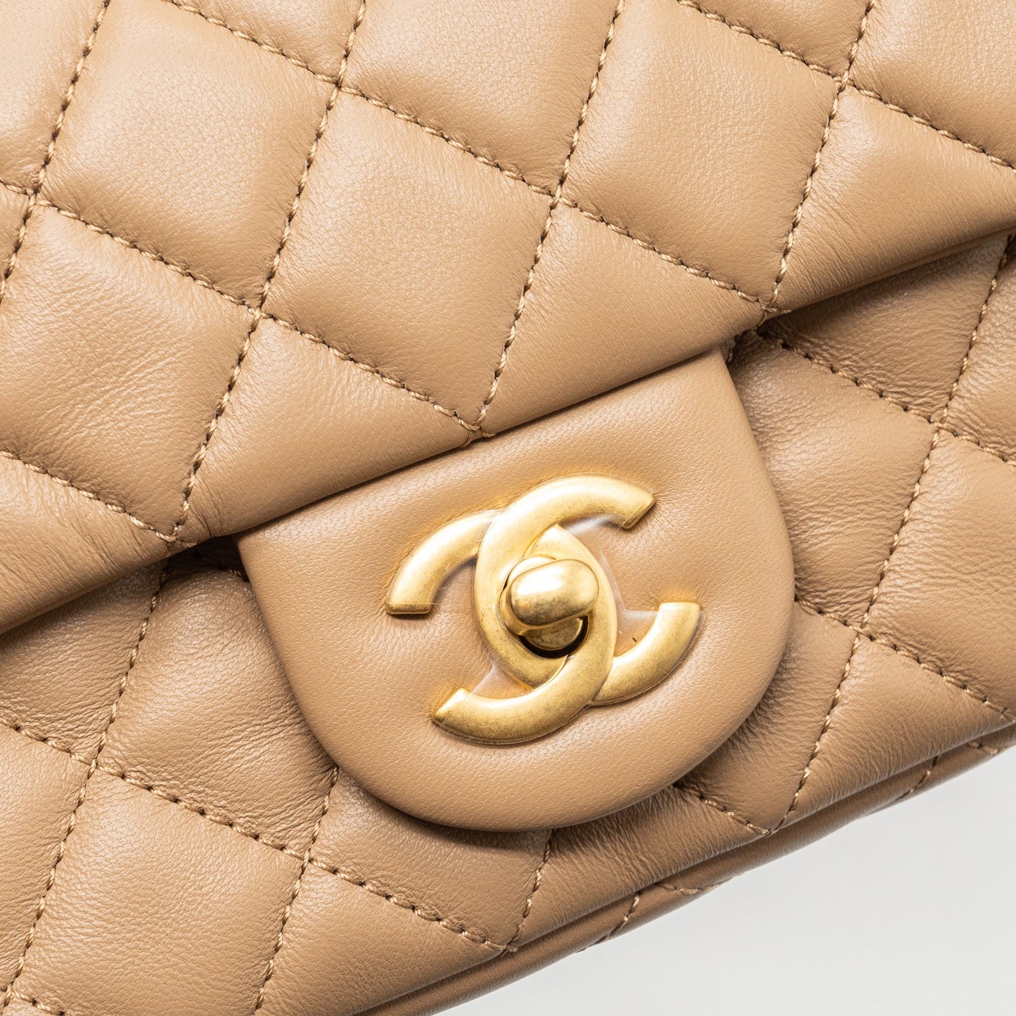 Chanel 22B pearl crush mini rectangular flap bag lambskin dark Beige  (Microchip)