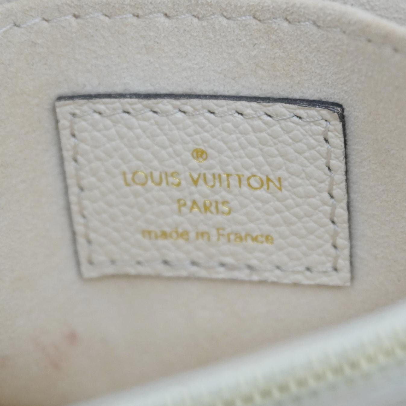 LOUIS VUITTON Madeleine MM Monogram Empreinte Leather Top Handle Bag White
