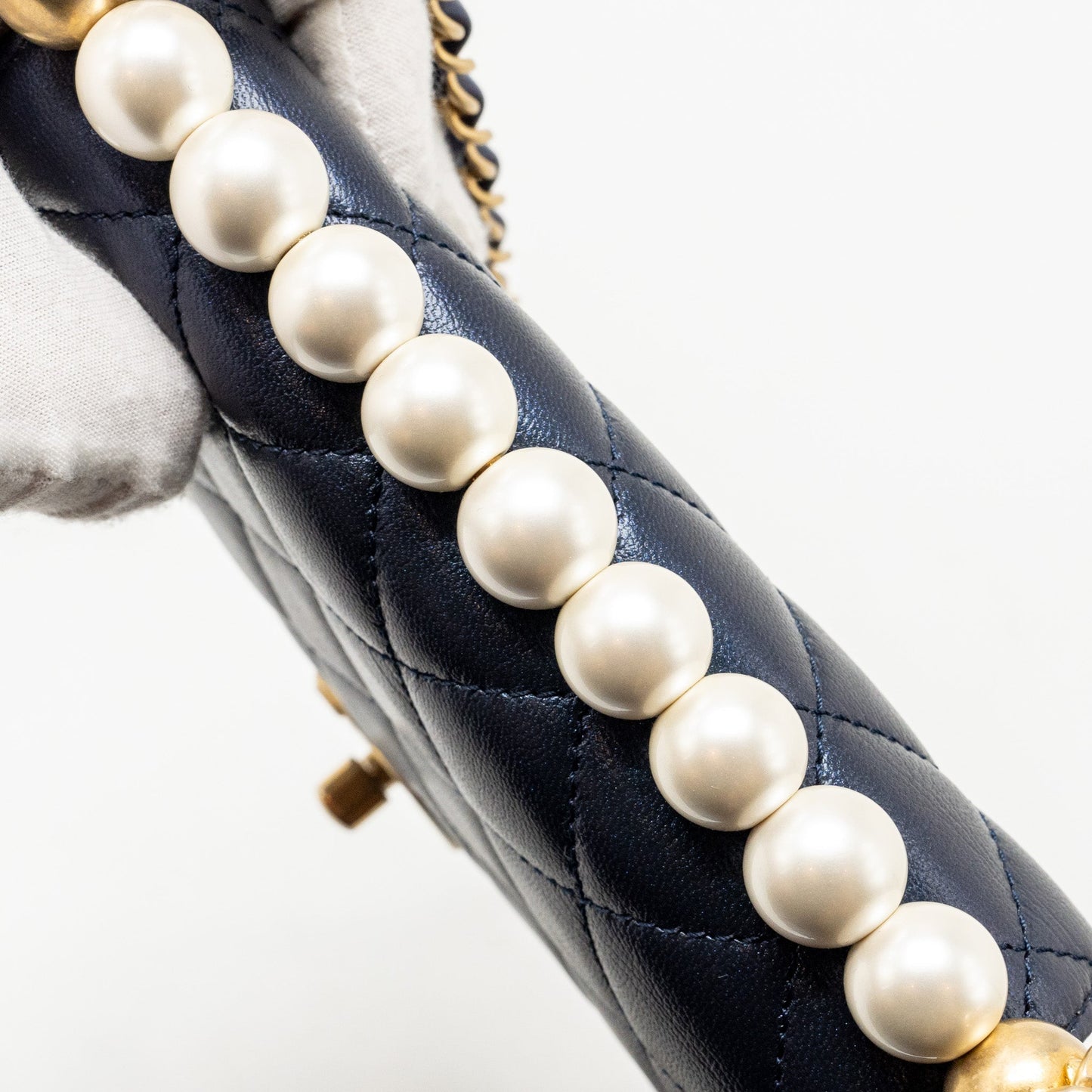 Chanel pearl decorated quilted flap bag lambskin navy