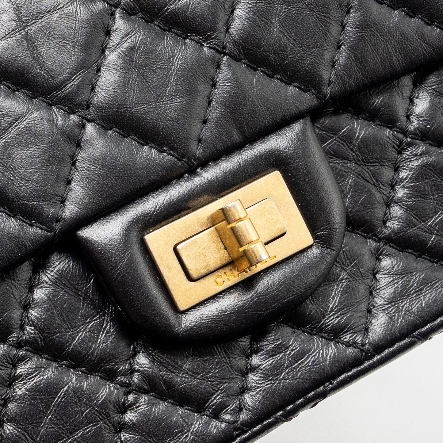 Chanel mini 2.55 reissue flap bag aged calfskin black
