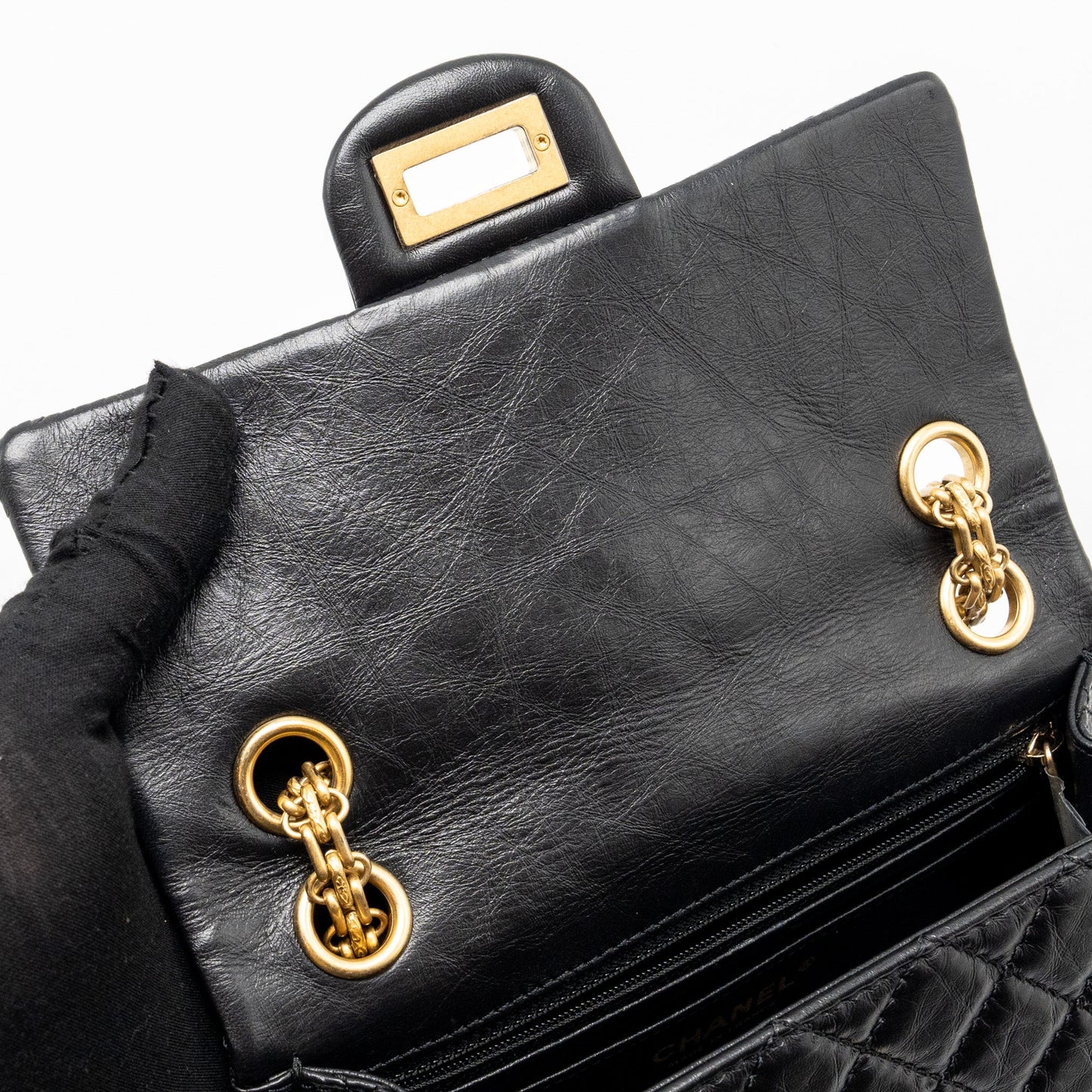 Chanel mini 2.55 reissue flap bag aged calfskin black