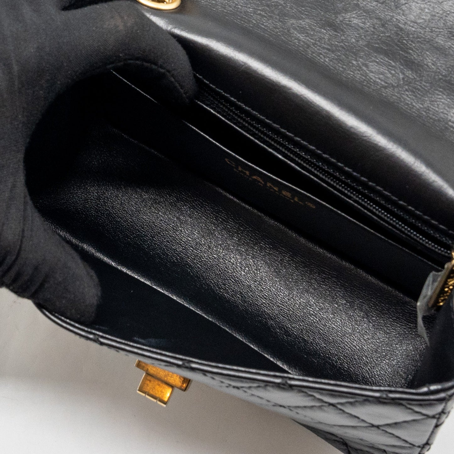 Chanel mini 2.55 reissue flap bag aged calfskin black