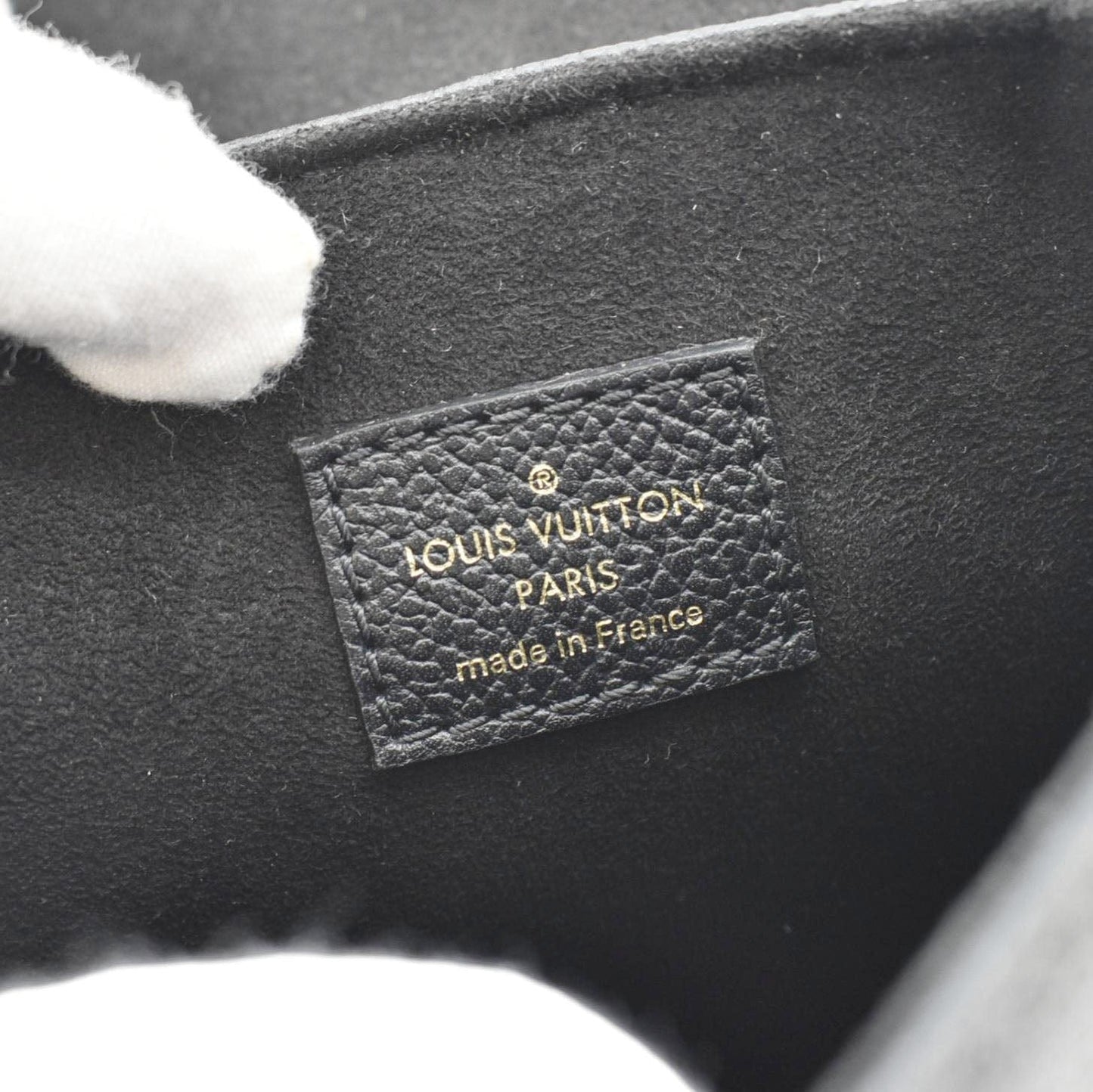 LOUIS VUITTON Tiny Monogram Empreinte Leather Backpack Black