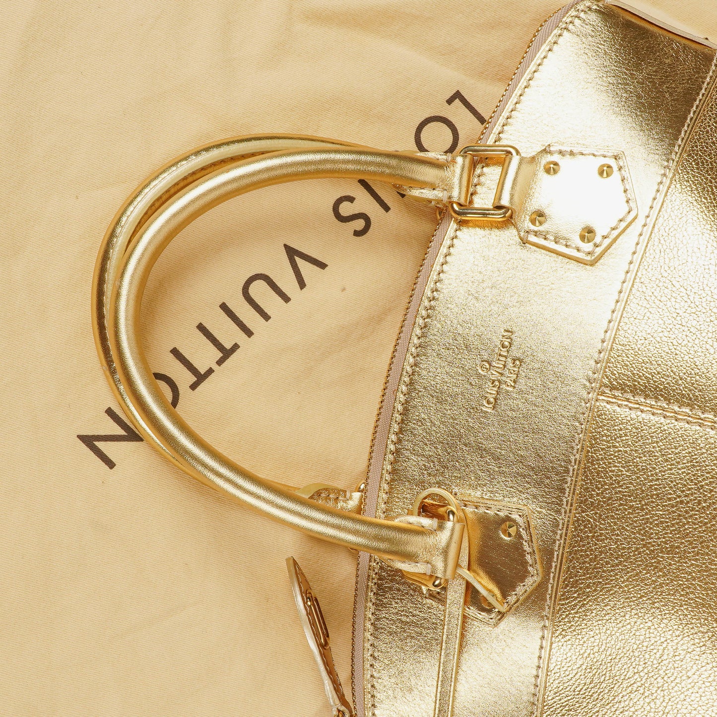 Louis Vuitton Lockit Suhali Gold Leather Bag