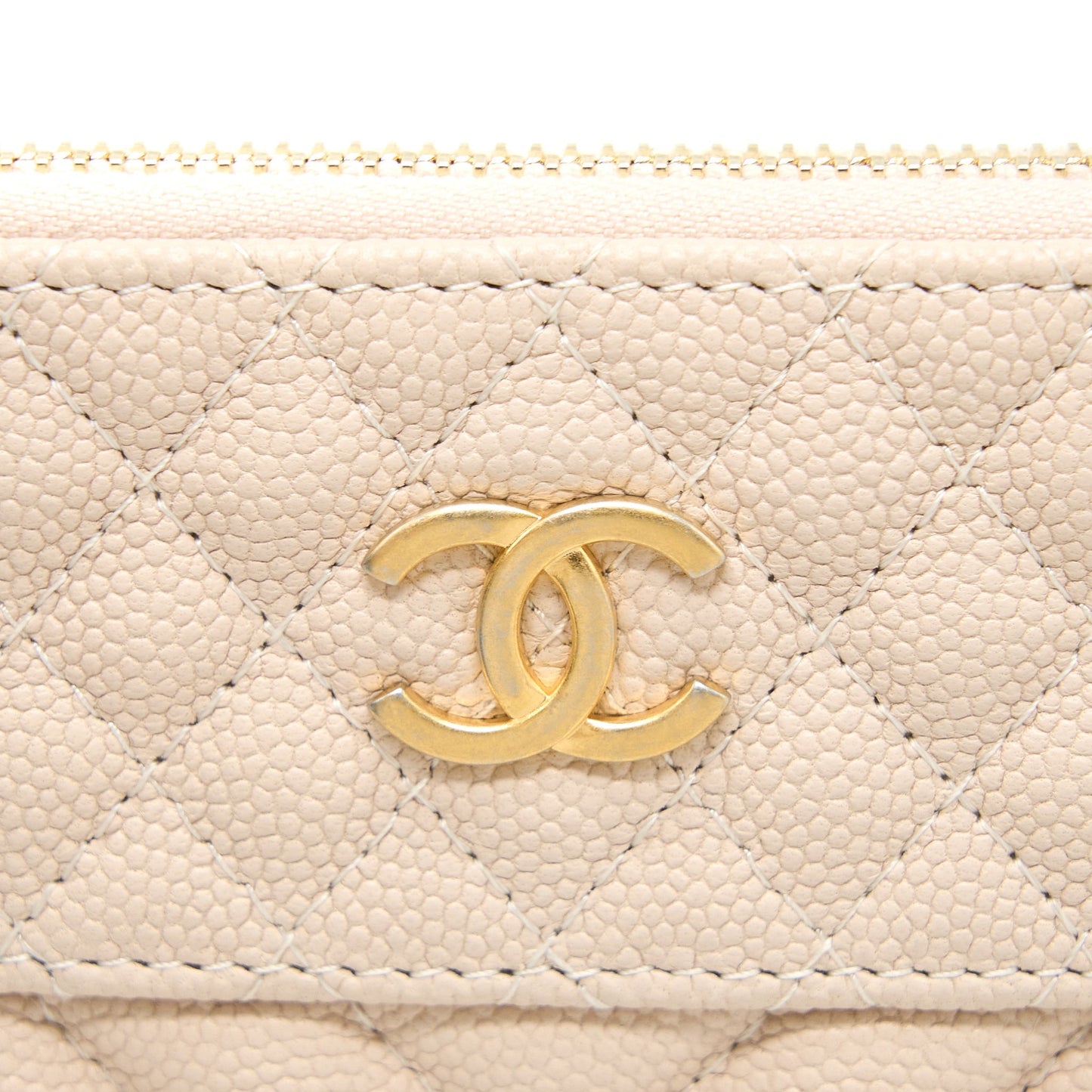 Chanel Clutch Chevron Caviar Beige