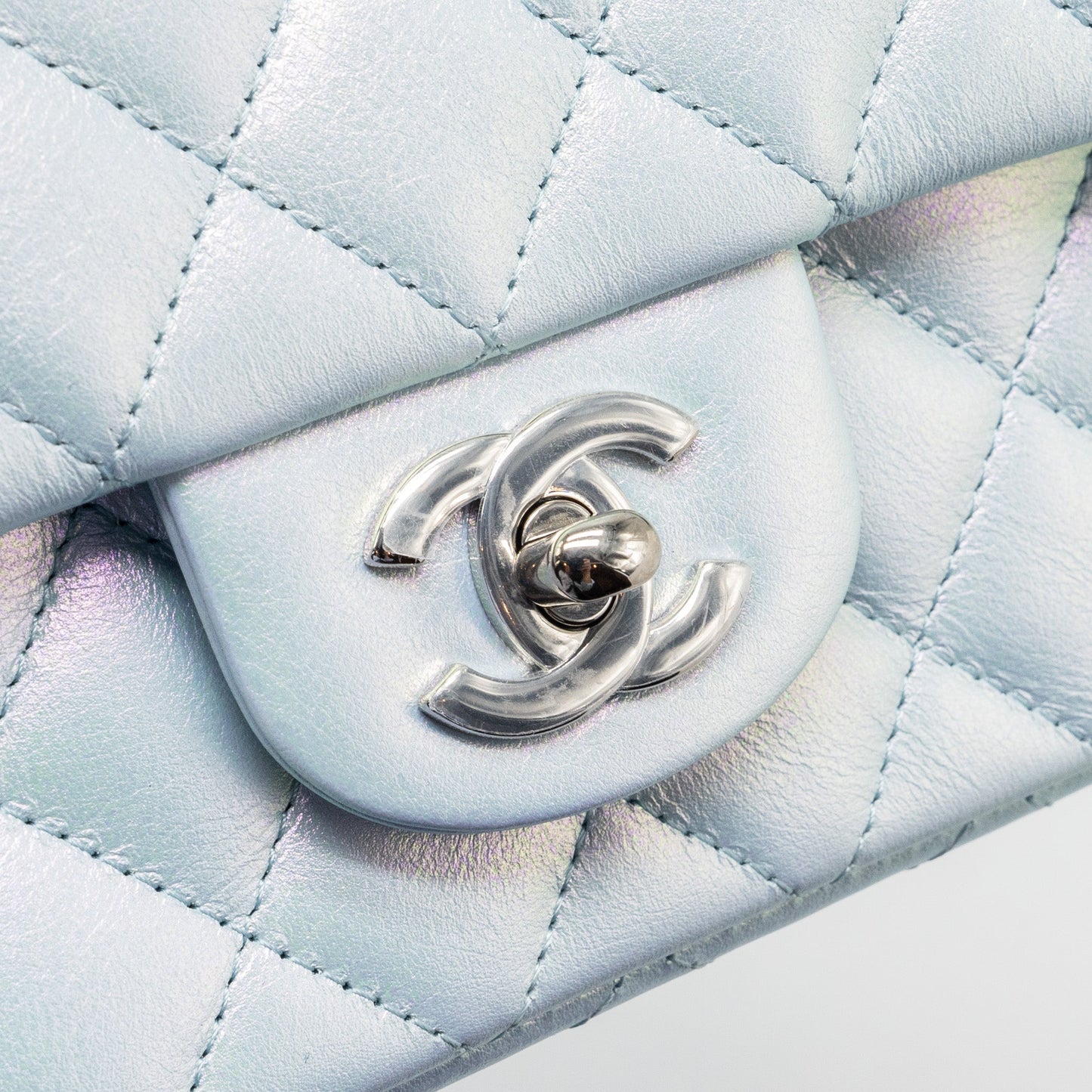 Chanel 21K mini rectangular flap bag calfskin iridescent light blue  (microchip)
