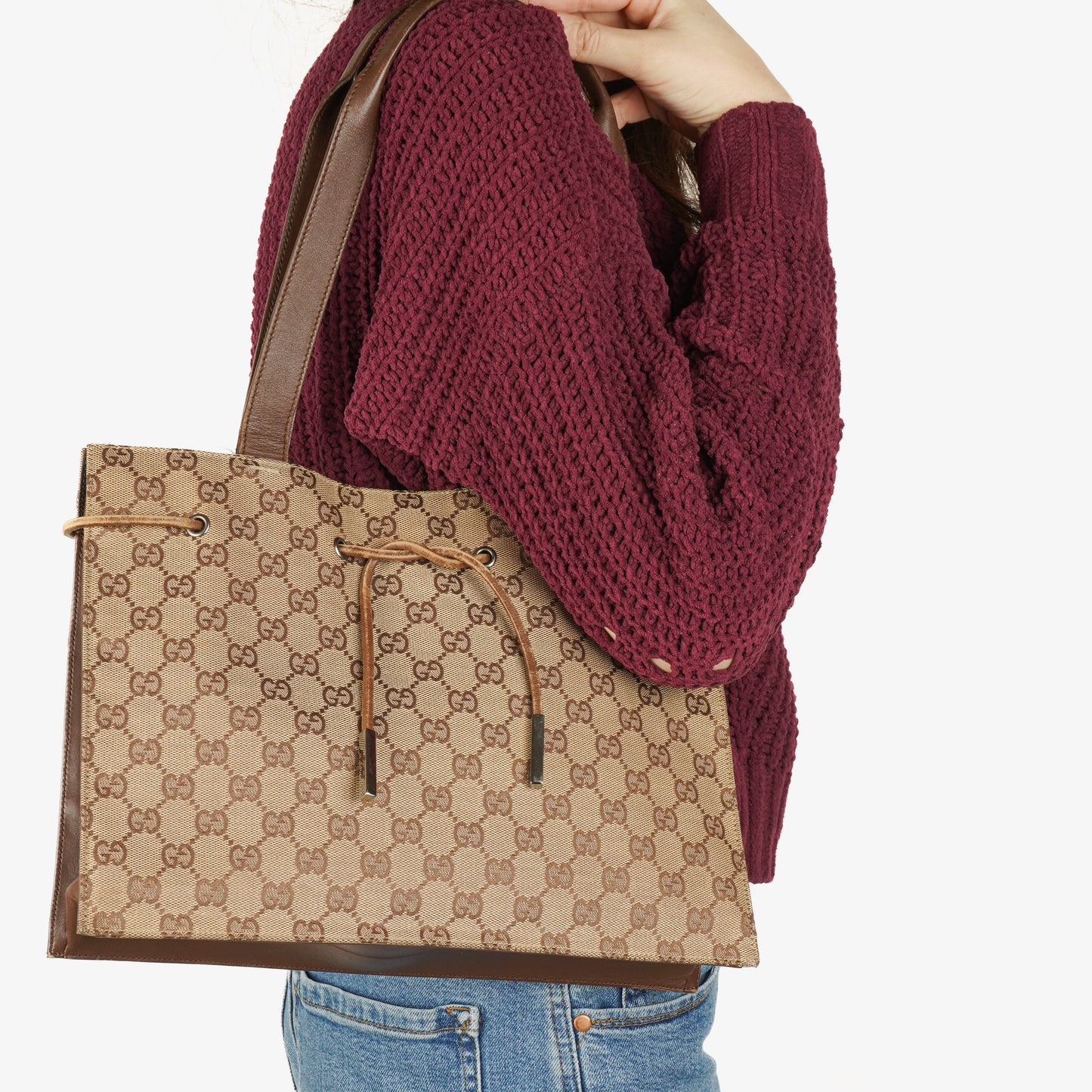 Gucci Brown Monogram Drawstring Bag