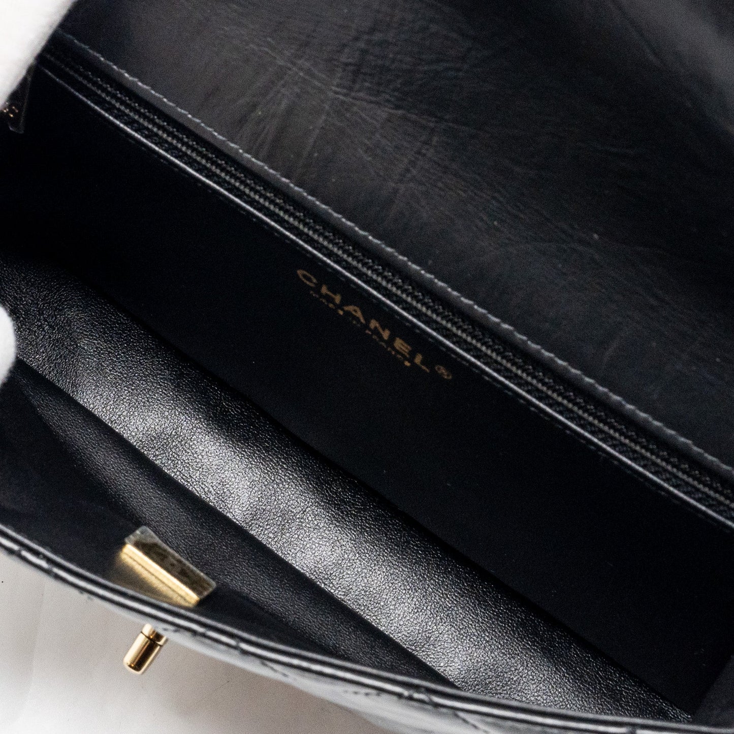 Chanel 23A classic flap clutch shiny calfskin black L (microchip)