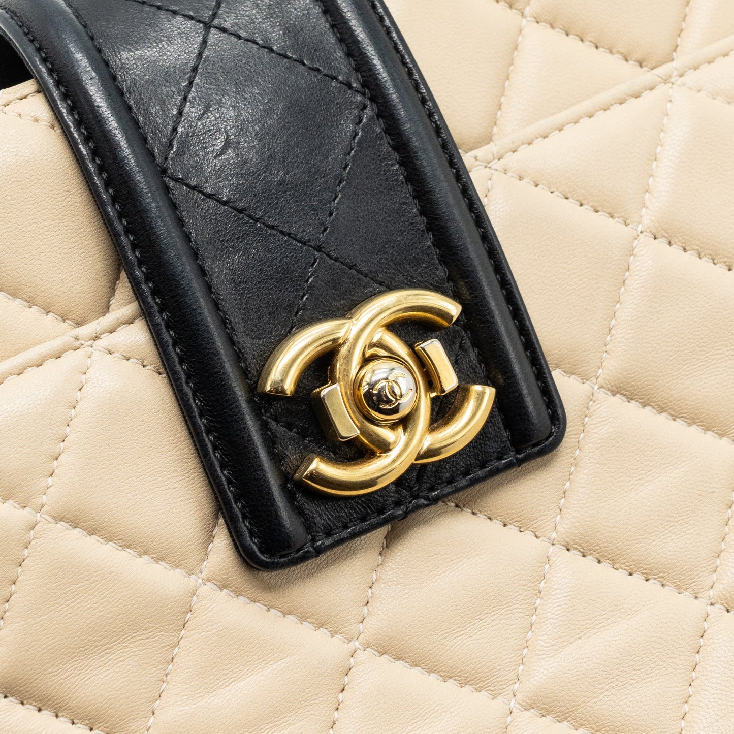 Chanel Quilted small shopping tote bag lambskin beige / black