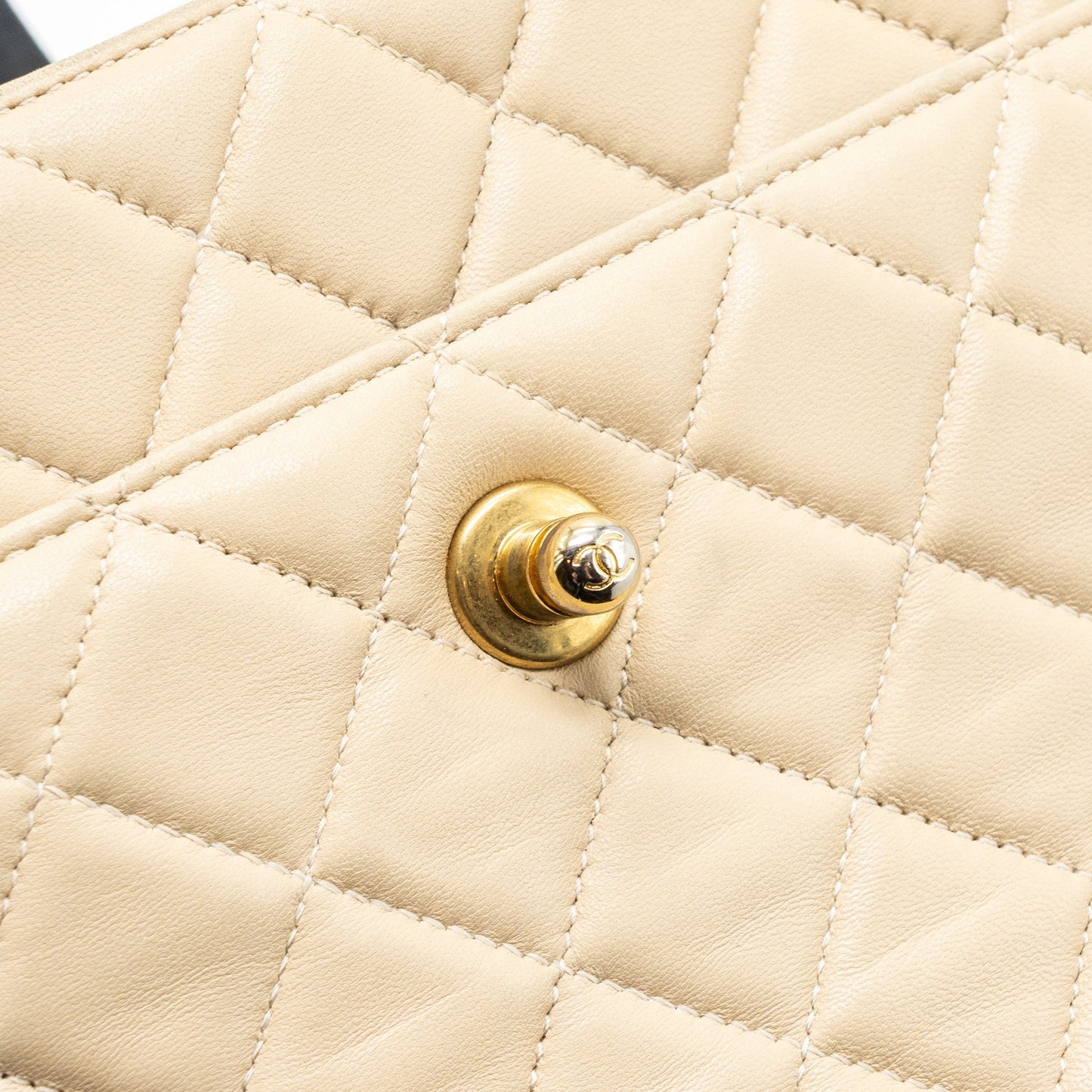 Chanel Quilted small shopping tote bag lambskin beige / black