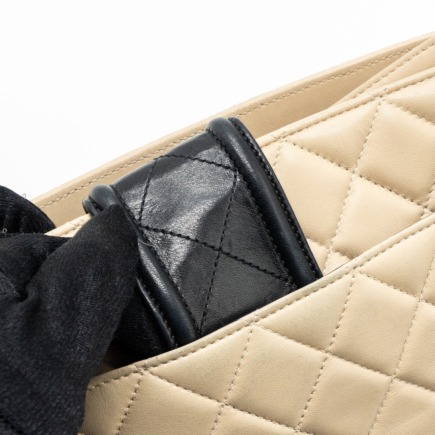 Chanel Quilted small shopping tote bag lambskin beige / black