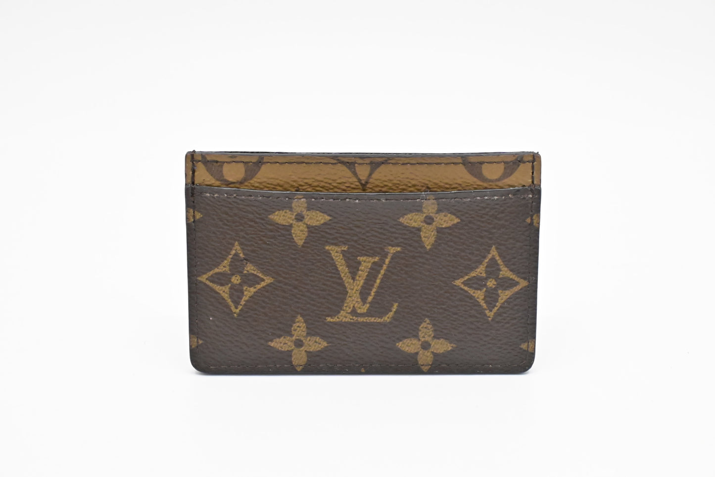 Louis Vuitton Card Case in Reverse Monogram Canvas