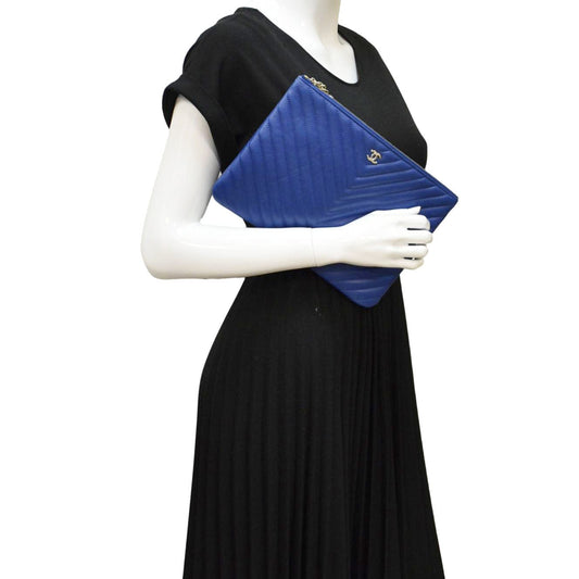 CHANEL O Case Chevron Leather Clutch Bag Blue