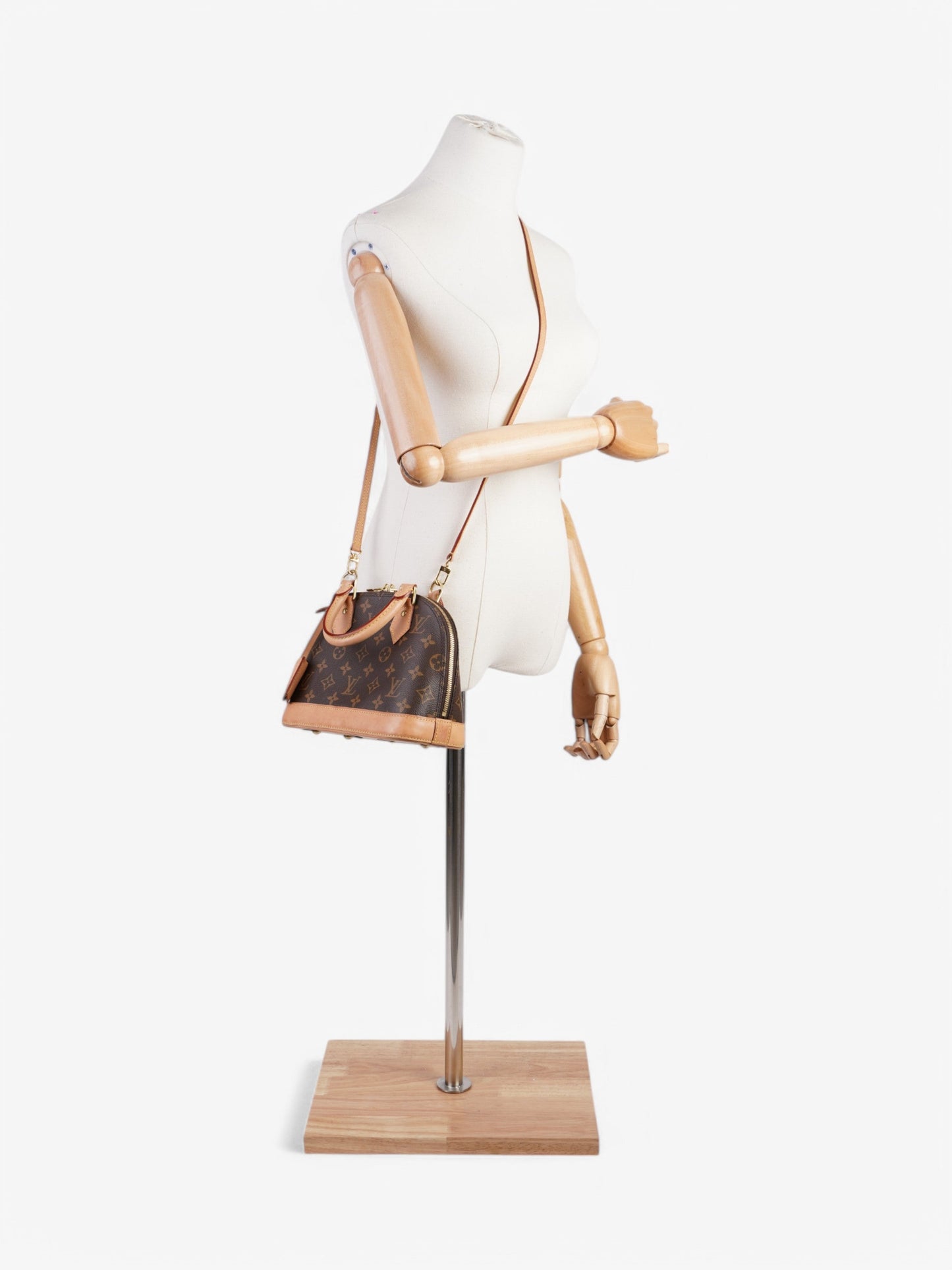 Louis Vuitton Alma Monogram Coated Canvas BB