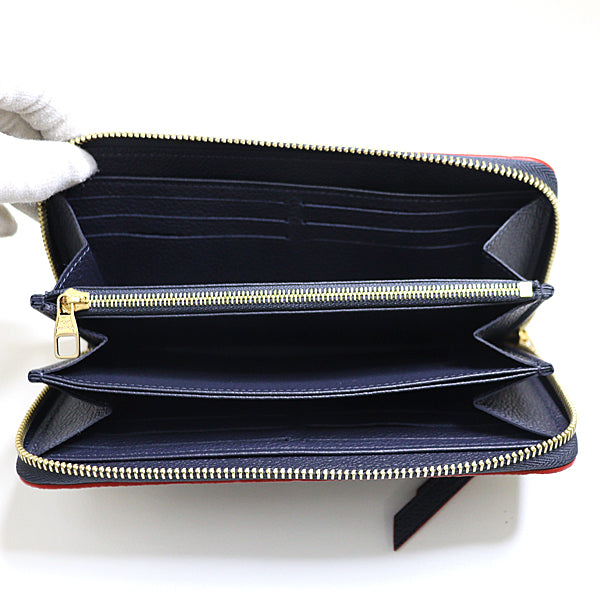 LOUIS VUITTON Long Wallet Purse M62121 Monogram Empreinte leather Navy Monogram �E An plant Zippy wallet Women