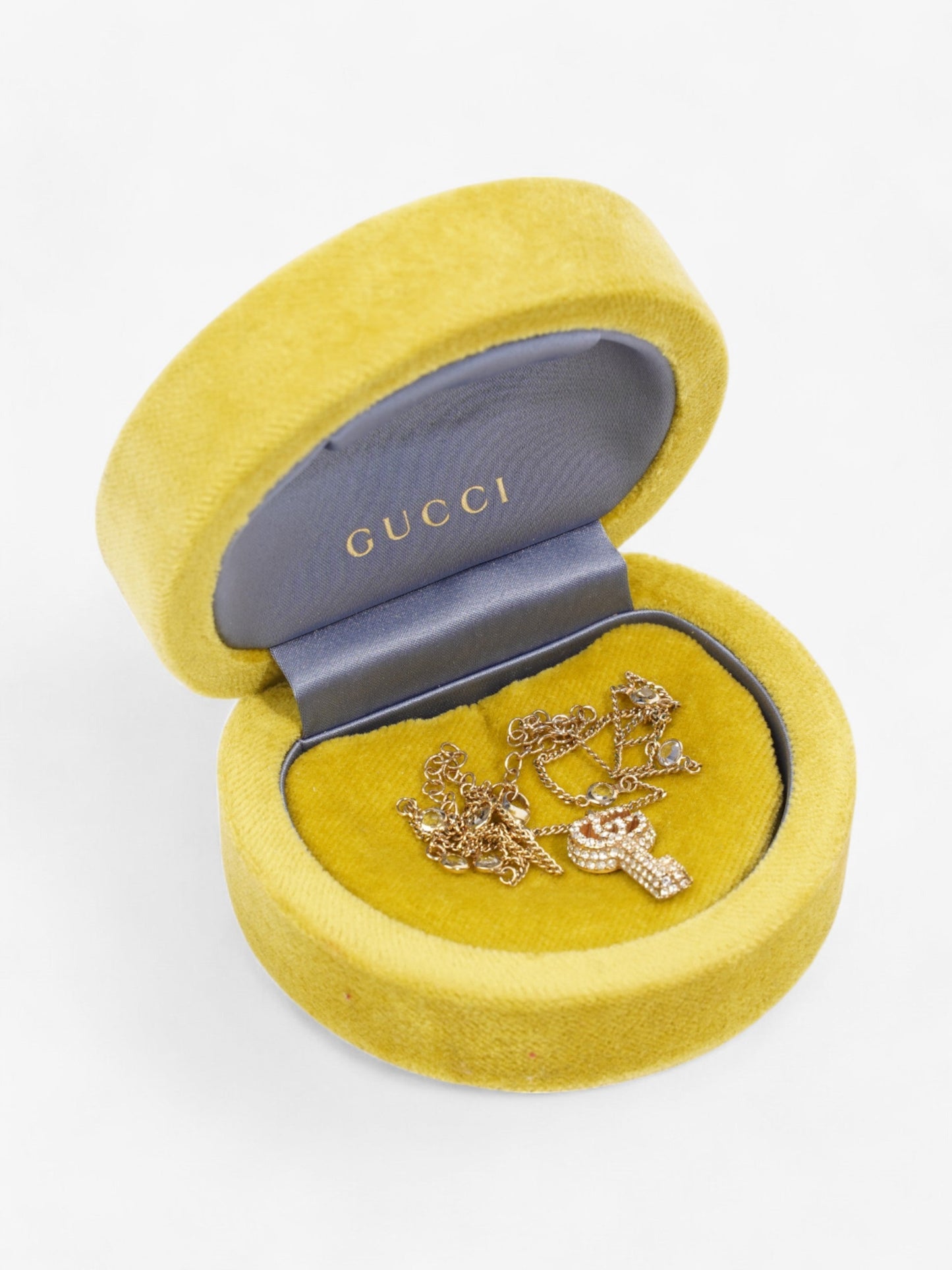 Gucci GG Key Pendant with Crystals Gold / White Base Metal