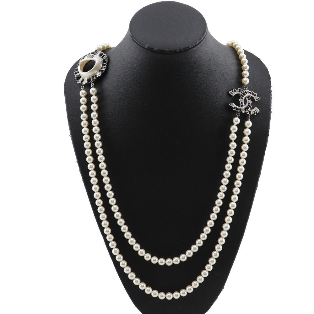 CHANEL Necklace Faux pearls, rhinestones black COCO Mark Smile