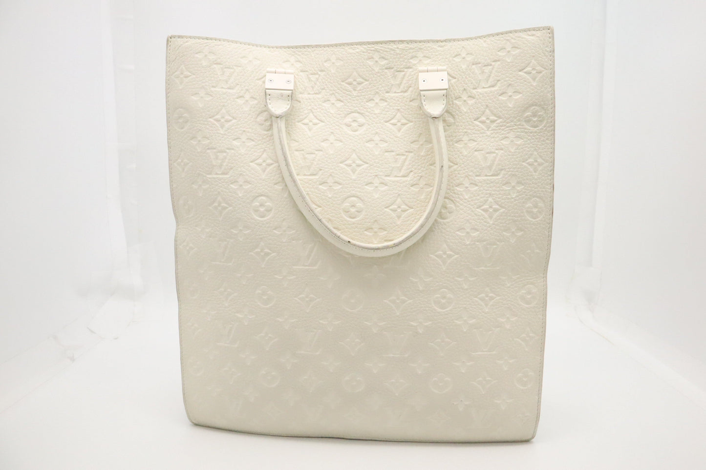 Louis Vuitton Sac Plat in Off White Empreinte Leather