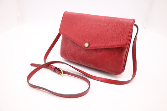 Louis Vuitton Twice Crossbody in Red Empreinte Leather