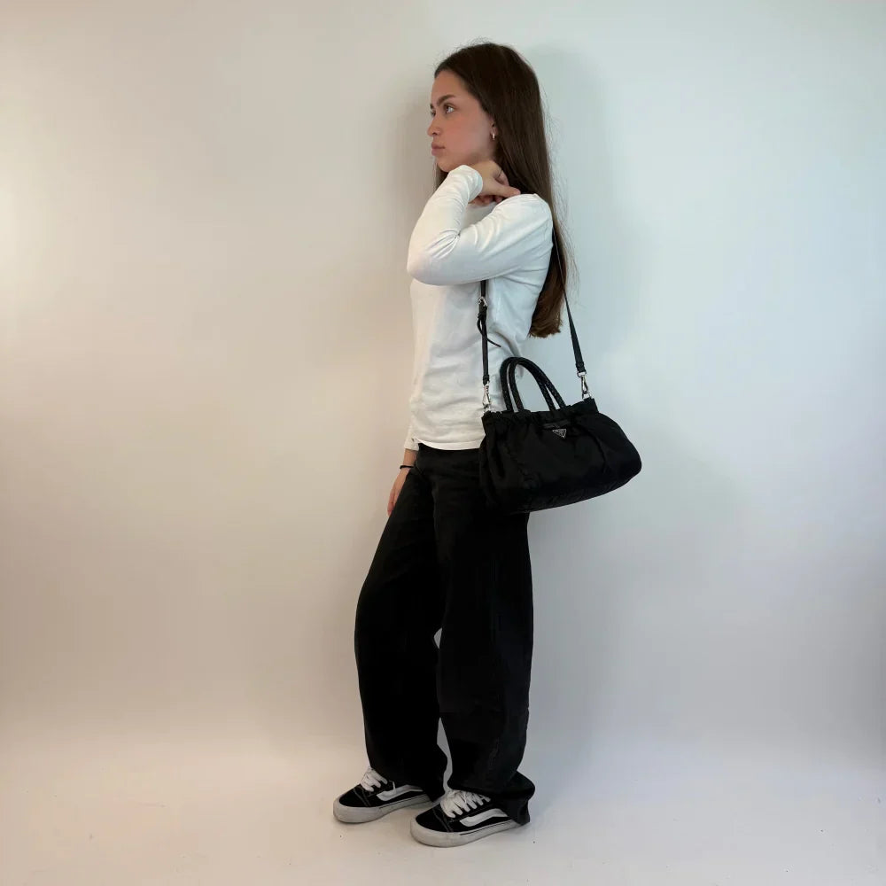 Prada handbag with shoulder strap made of nylon black