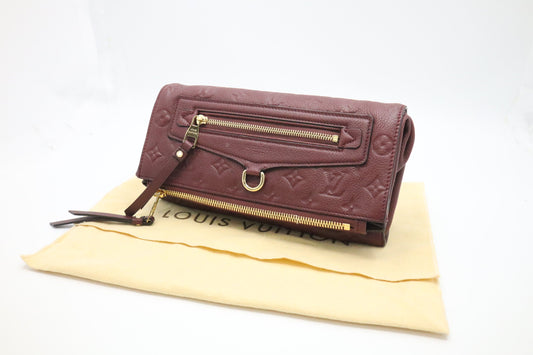 Louis Vuitton Petillante Clutch in Flamme Empreinte Leather