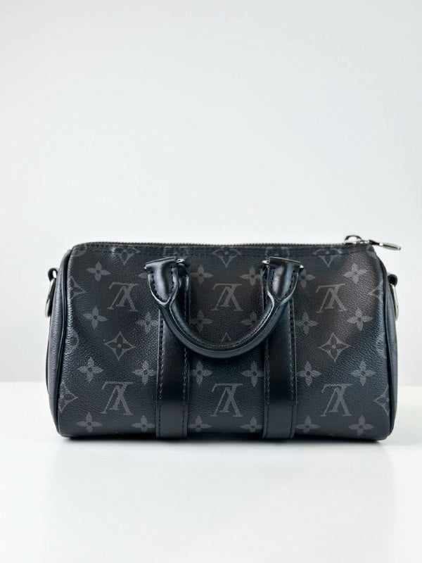 LOUIS VUITTON KEEPALL 25 BANDOULIERE MONOGRAM ECLIPSE CROSSBODY BAG