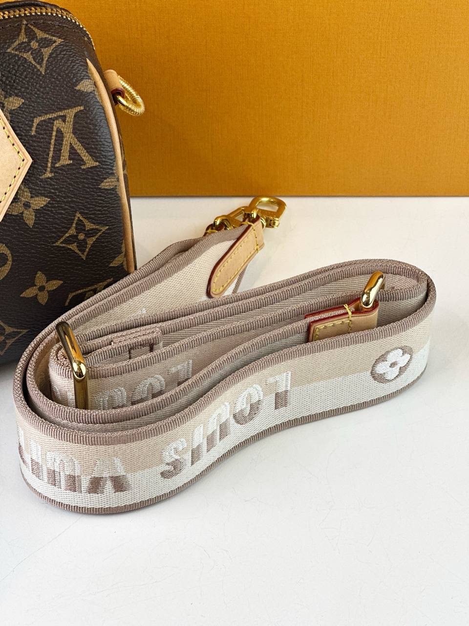 LOUIS VUITTON SPEEDY BANDOULIERE 20 MONOGRAM TOP HANDLE BAG WITH STRAP