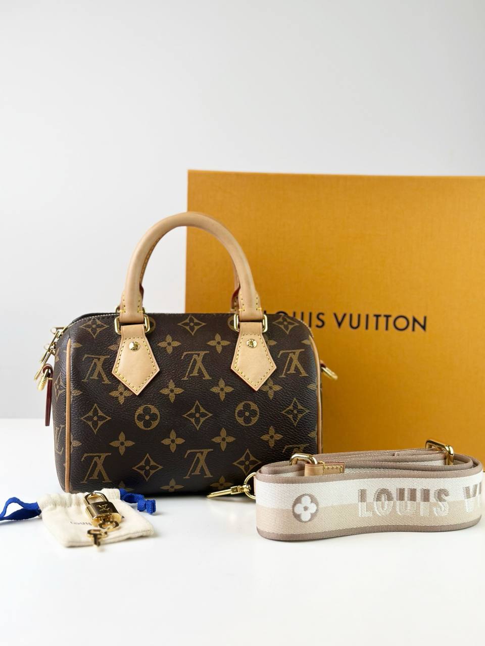 LOUIS VUITTON SPEEDY BANDOULIERE 20 MONOGRAM TOP HANDLE BAG WITH STRAP