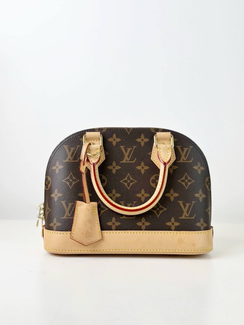 LOUIS VUITTON MONOGRAM ALMA BB HANDBAG WITH STRAP