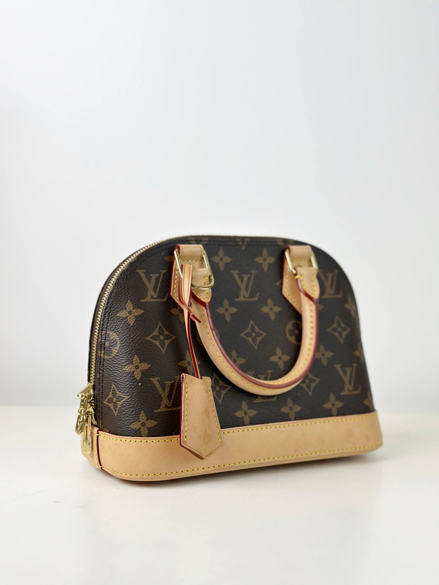 LOUIS VUITTON MONOGRAM ALMA BB HANDBAG WITH STRAP