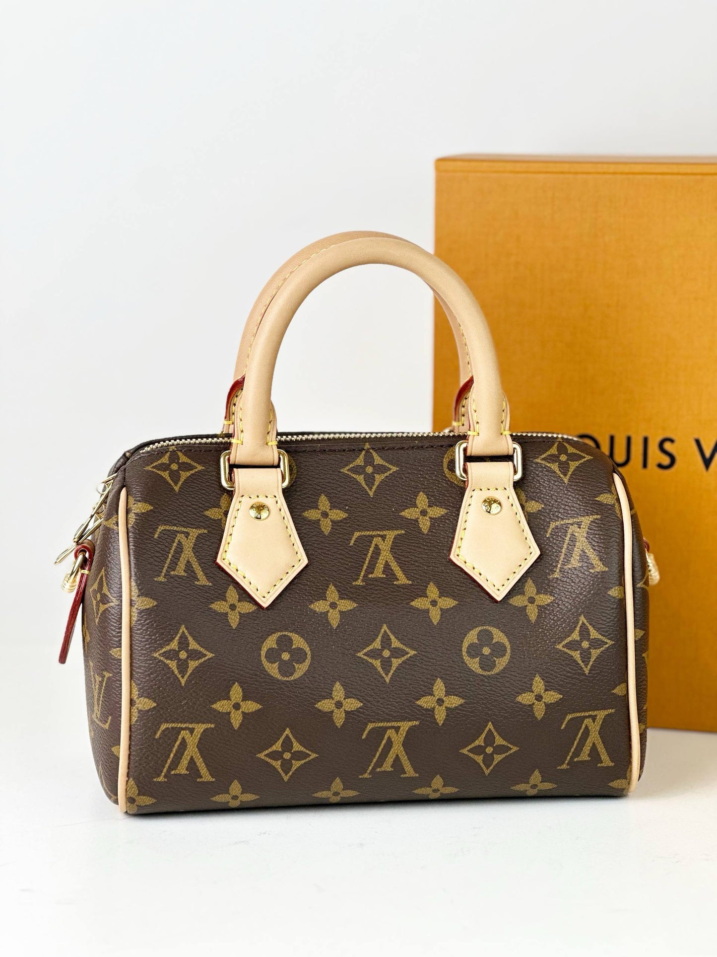 LOUIS VUITTON SPEEDY BANDOULIERE 20 MONOGRAM TOP HANDLE BAG WITH BEIGE PINK STRAP