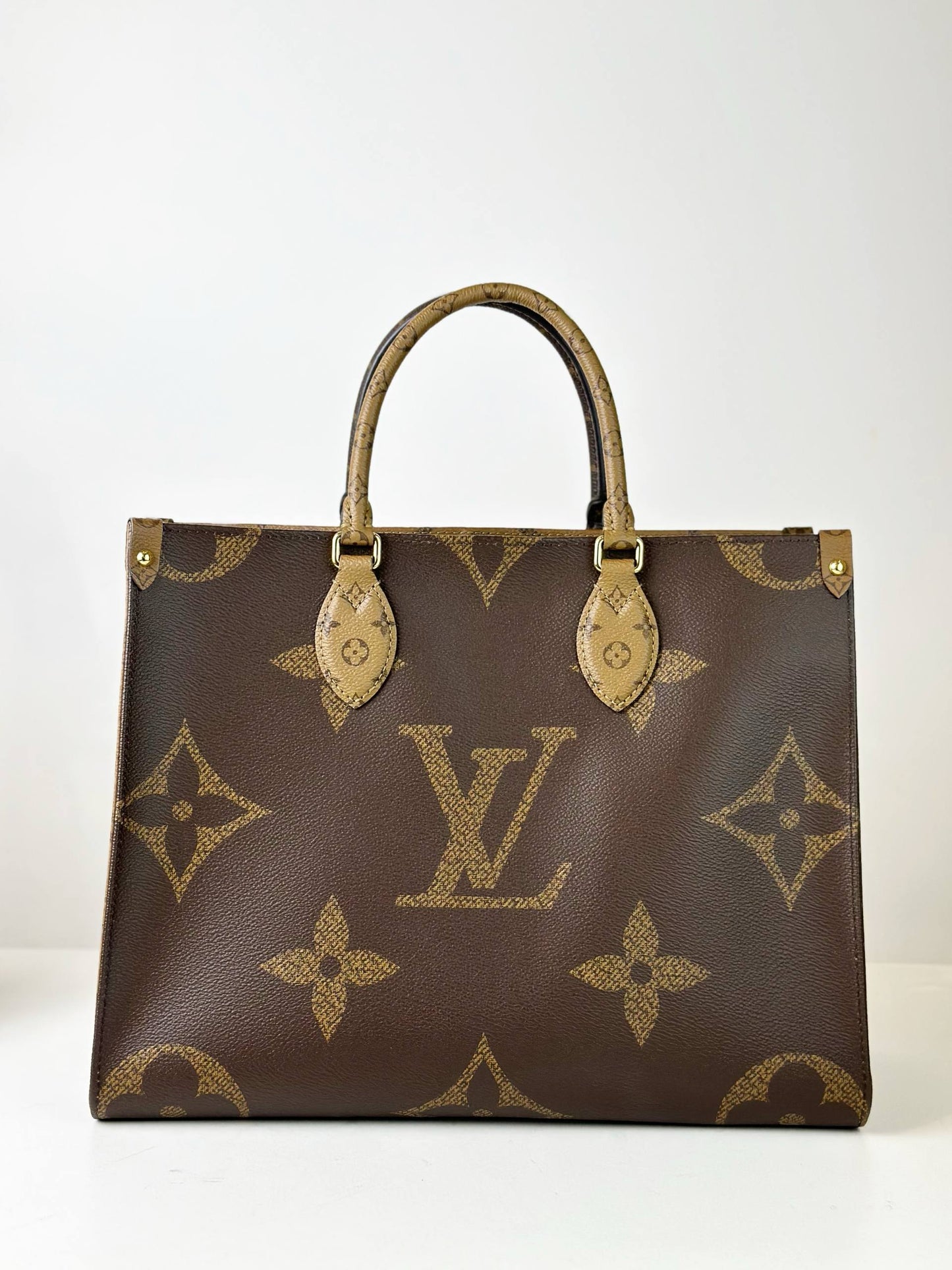 LOUIS VUITTON ONTHEGO MM REVERSE MONOGRAM HANDBAG