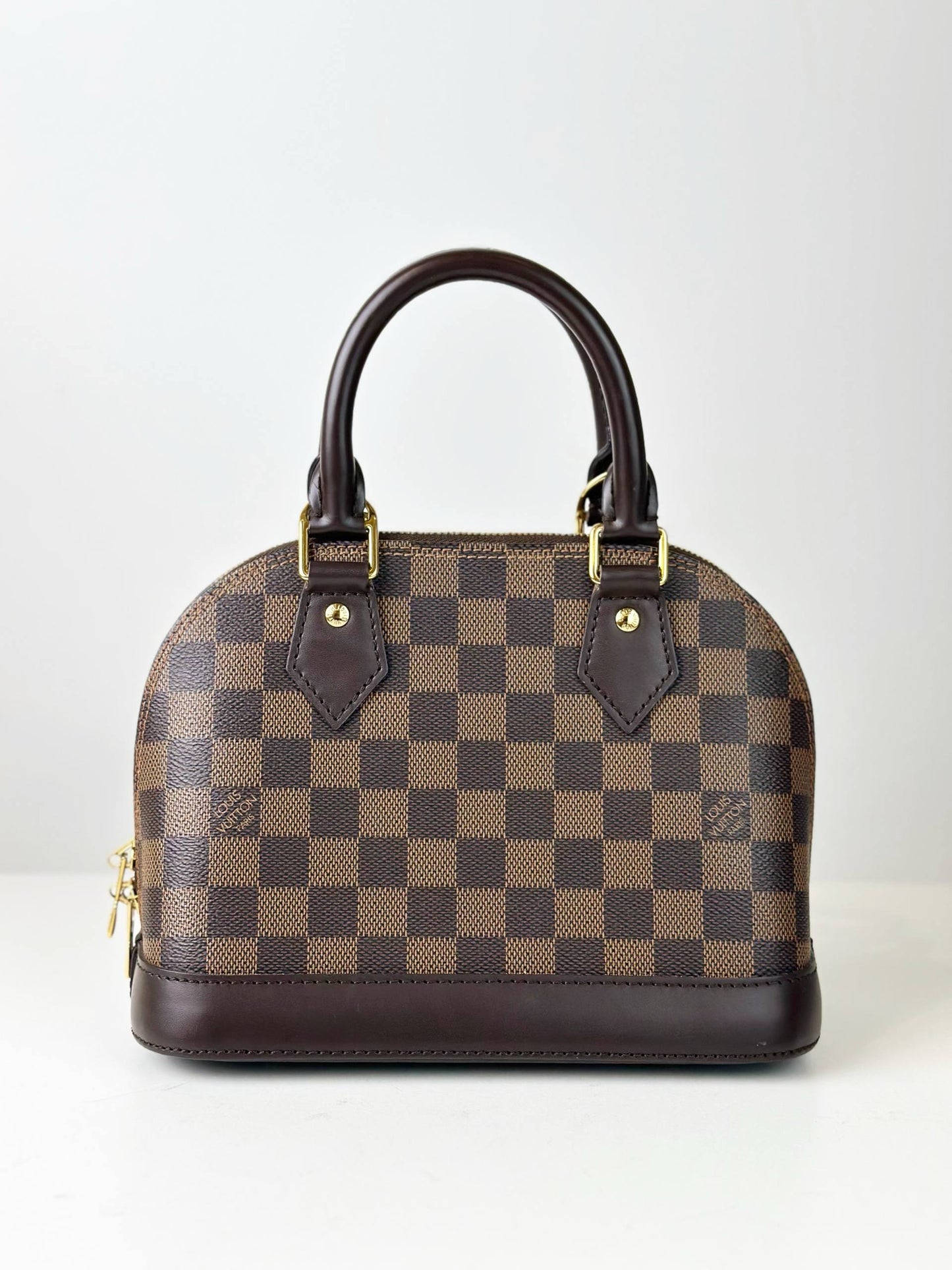 LOUIS VUITTON DAMIER EBENE ALMA BB HANDBAG WITH STRAP