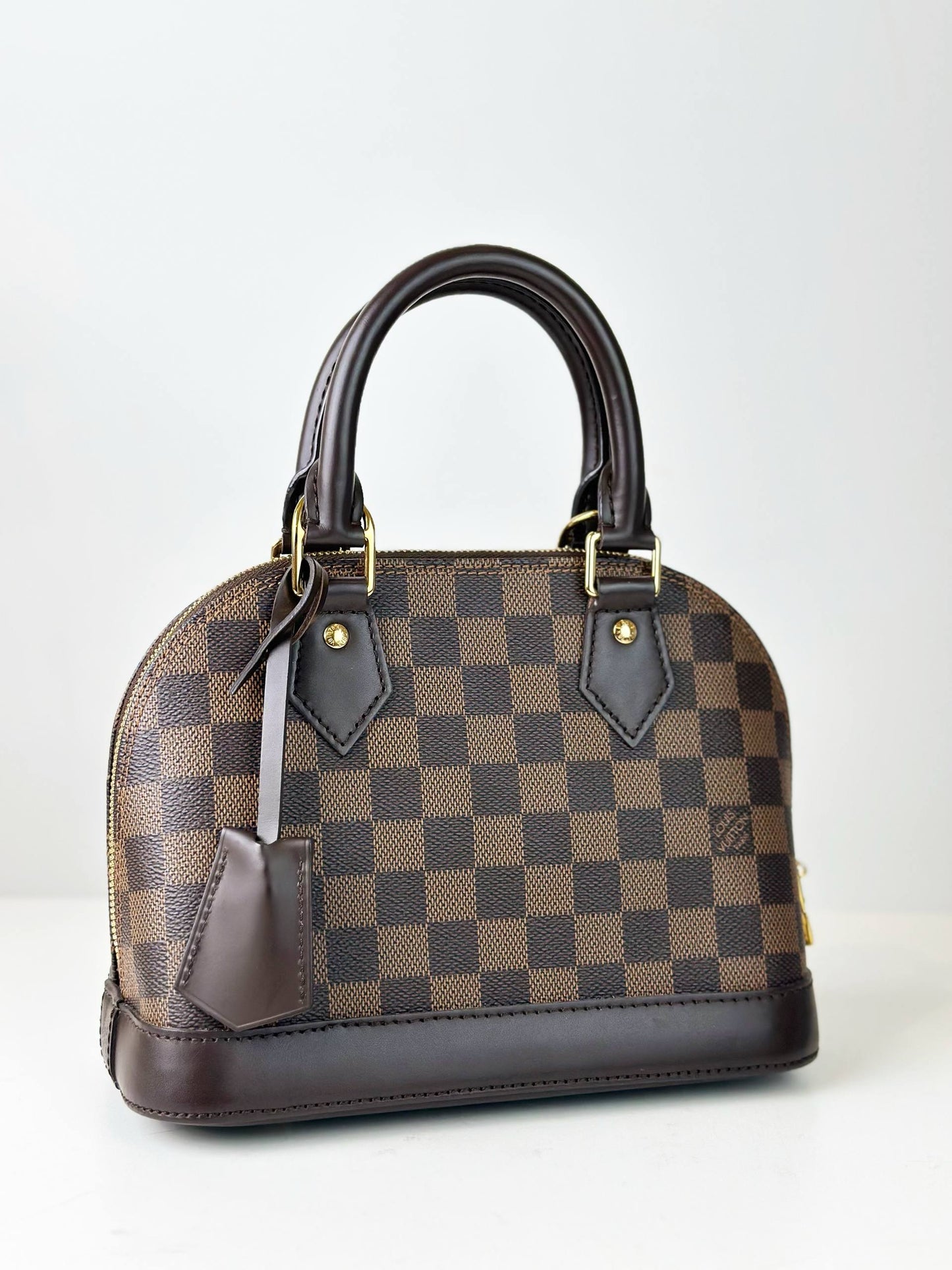 LOUIS VUITTON DAMIER EBENE ALMA BB HANDBAG WITH STRAP