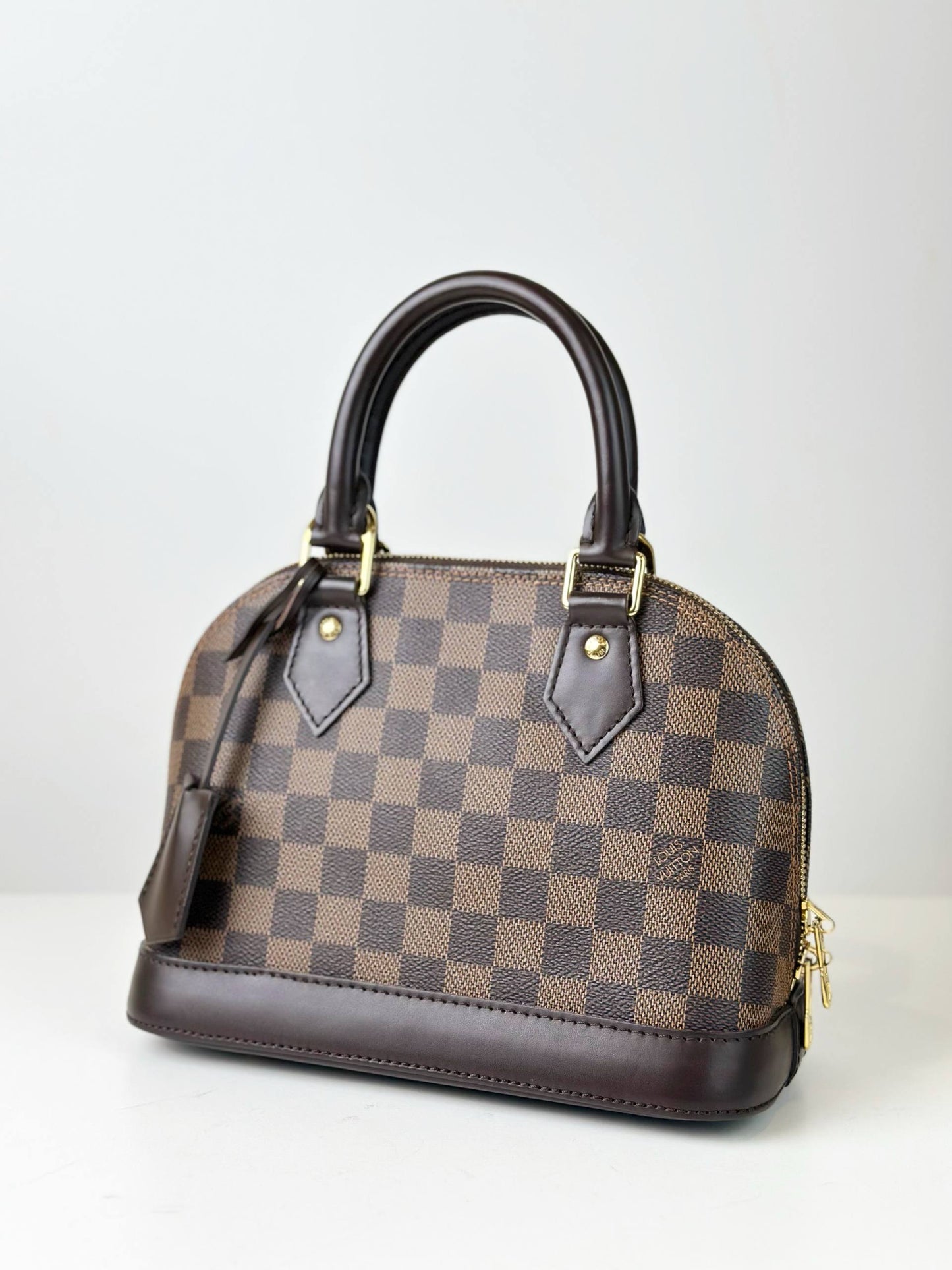 LOUIS VUITTON DAMIER EBENE ALMA BB HANDBAG WITH STRAP