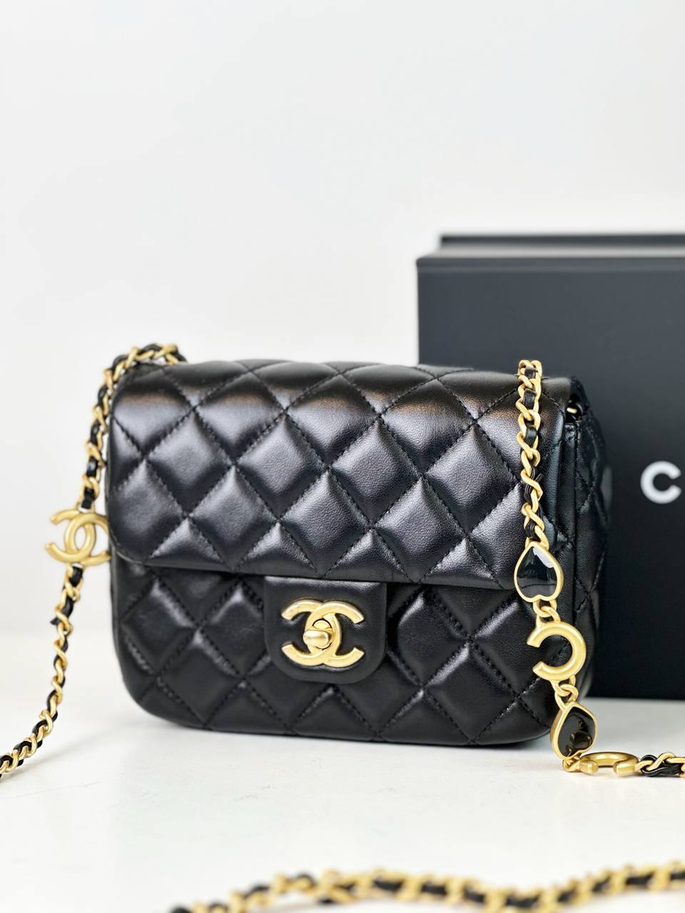 CHANEL 22K BLACK QUILTED SMALL SQUARE FLAP CROSSBODY BAG