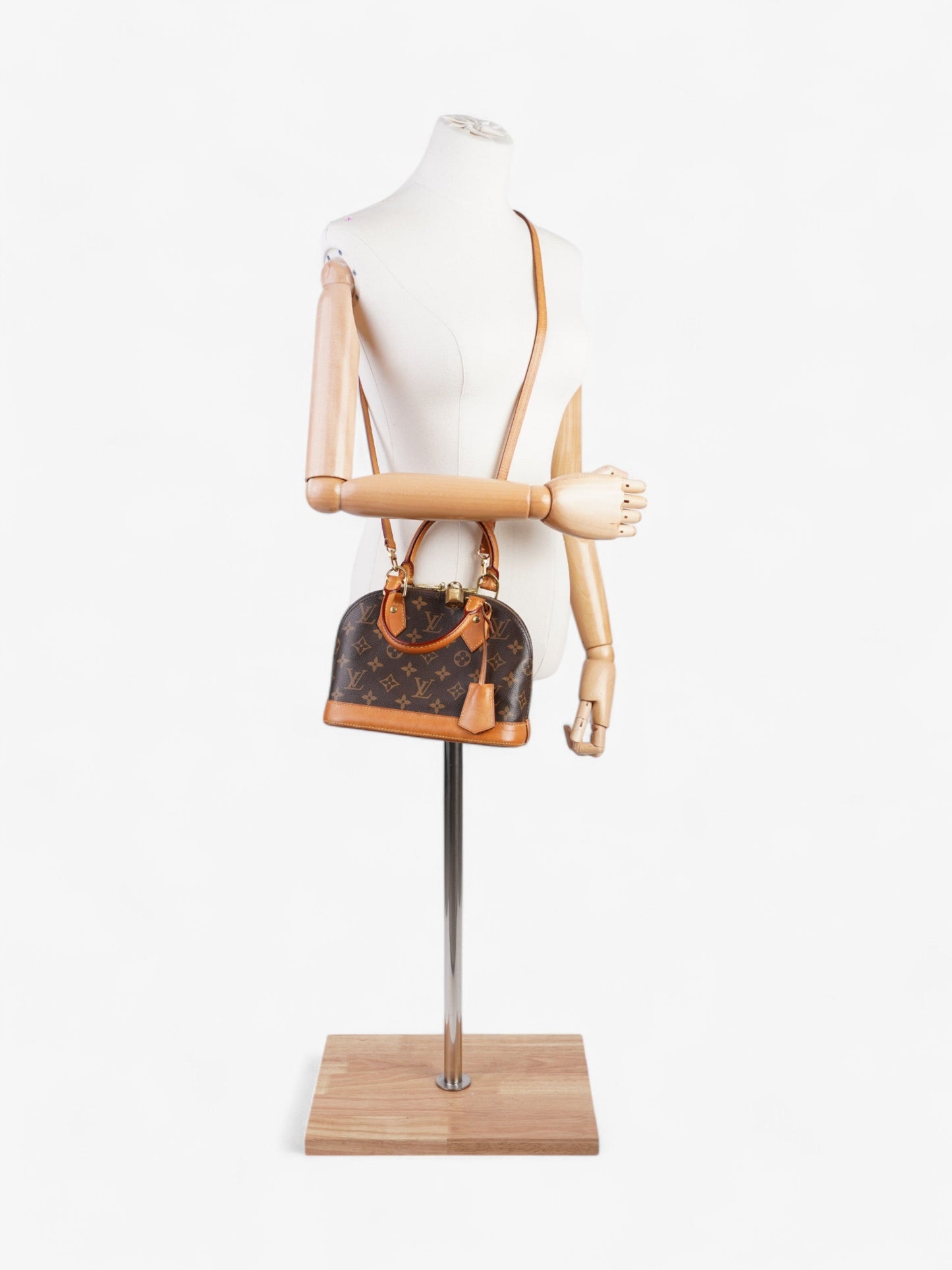 Louis Vuitton Alma Monogram Coated Canvas BB