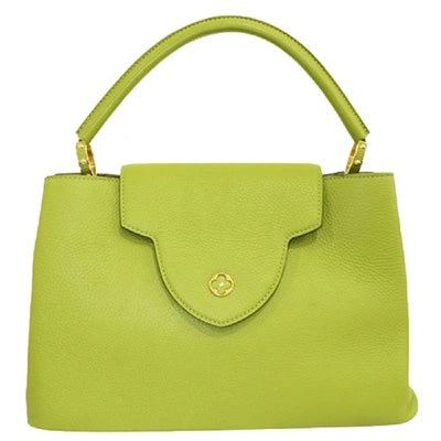 LOUIS VUITTON CAPUCINES MM LEATHER PARNASSÃA HANDBAG