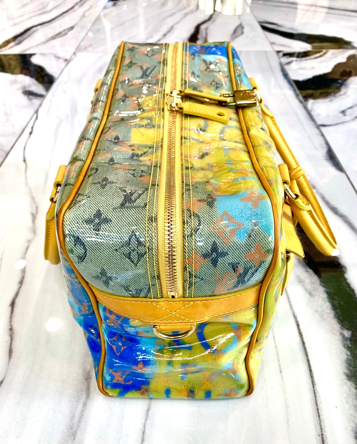 LOUIS VUITTON MULTI-COLOR MONOGRAM PULP WEEKENDER PM